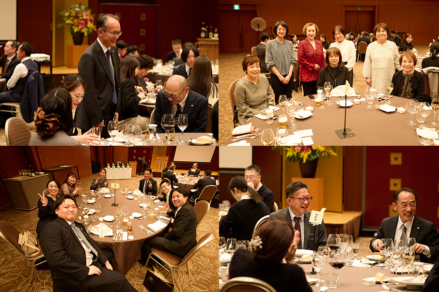 会場内の各テーブルで歓談する社員たち